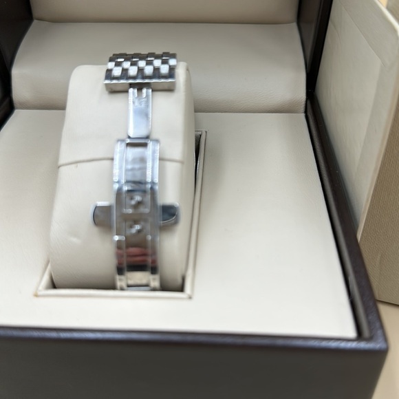 Vintage Burberry ladies watch. EUC box and original paperwork. Stainless band